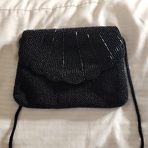 Black shell cross body bag